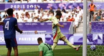 Olympics soccer: France struggle; Spain, Japan in QF