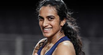Sindhu fights back to win; enters Malaysia quarters
