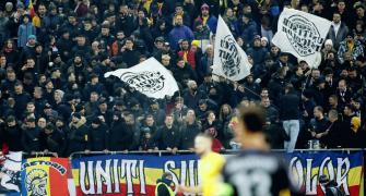 Kosovo players stage walkout after threatening chants