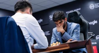 Chess C'ship: Game 2 draw keeps Ding in control