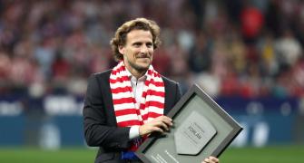 World Cup star Forlan takes up tennis racket