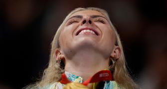 Fortune teller gets it right as Aus swimmer takes gold