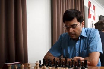 PIX: Vishy Anand celebrates International Chess Day with son - Rediff.com