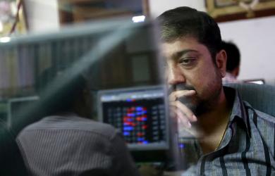 Sensex, Nifty end in red in volatile trade