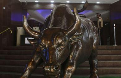 Sensex closes higher 410 pts in volatile trade
