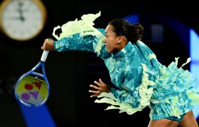 Osaka turns Rod Laver into a runway, battles into round 2