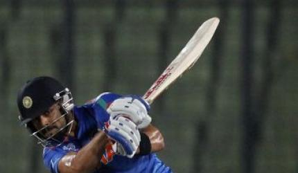 WT20 warm-up: Raina, Kohli guide India to an easy win over England