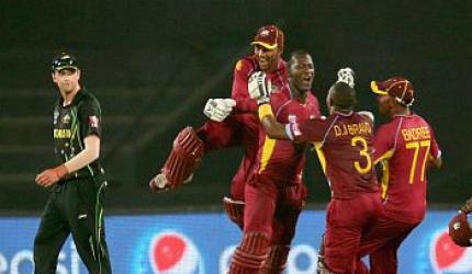 Gayle, Sammy take Windies past Australia in thriller