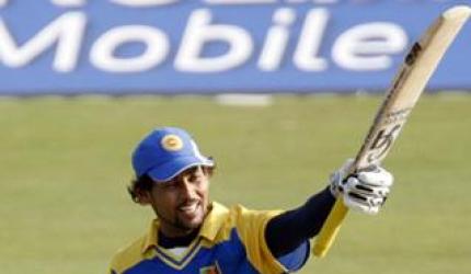 Dilshan hundred as Lanka win rain-marred opener