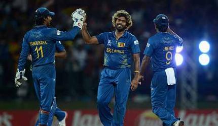 PHOTOS: Sri Lanka thrash England to enter semis