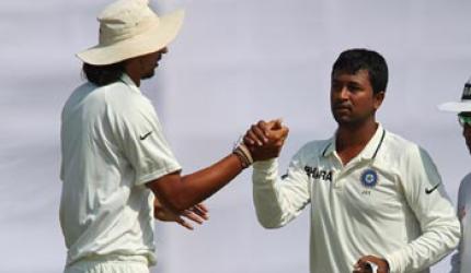 Ojha reaches 100-wicket milestone in Tests