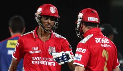 Punjab qualify for IPL play-offs after shaky win against Delhi