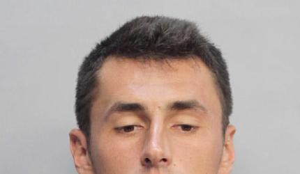 Australian tennis player Tomic charged after noisy penthouse party