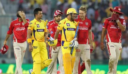 Chennai seal top spot with a crushing win over Kings XI 