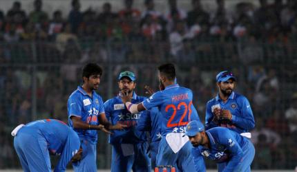 PHOTOS: Rohit shines as India crush Bangladesh in Asia Cup opener