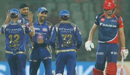 Mumbai spank Daredevils by 146 runs, seals play-offs spot