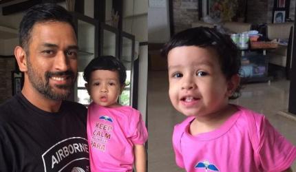 Cuteness alert! Dhoni in ladoo battle with daughter Ziva