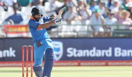 PIX: Kohli plays through cramps to lead India to massive win