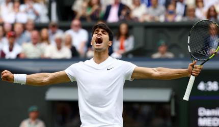 Alcaraz fights back to reach Wimbledon final