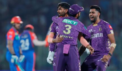 IPL PIX: Narine's spell spins KKR to vital win over DC