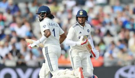 PHOTOS: Defiant India Fight to Live Another Day