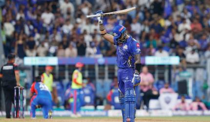 IPL PIX: Gritty Suryakumar lifts Mumbai to 180 vs DC