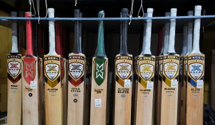 What forced MCC to change law on laminated bats?
