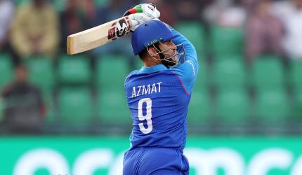 Omarzai stars as Afghanistan beat UAE to keep hopes alive