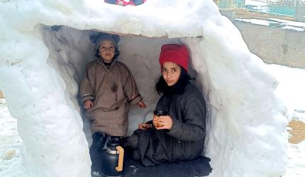 Enjoying Hot Tea In A Frozen Igloo