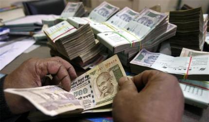 Rupee Falls to 90.96 Against US Dollar