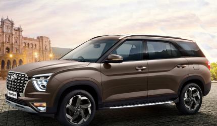 Three-row SUVs are the latest draw for auto firms