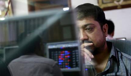 Sensex, Nifty end in red in volatile trade