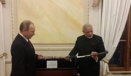 Putin gifts Modi 18th century sword and Bapu's handwritten notes