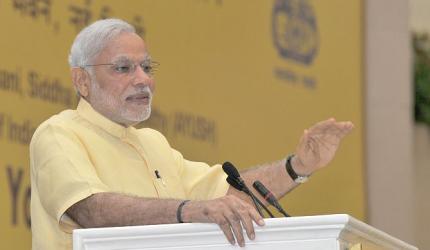 Yoga is a medium to check greed, violence: PM Modi