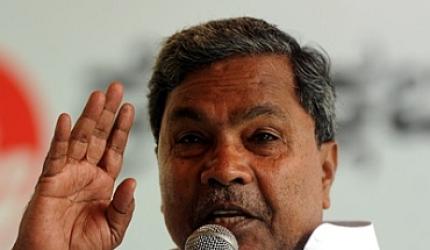 Siddaramaiah, Yeddyurappa Twitter war on Modi's charge   