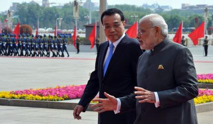 We must try to settle the boundary question quickly: Modi in China