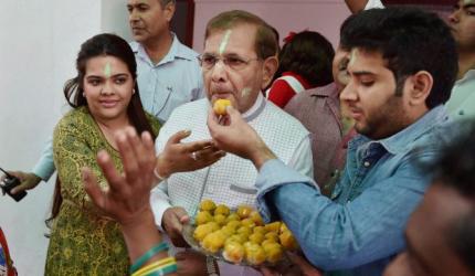 Laddoos on us! Mahagathbandhan rejoices