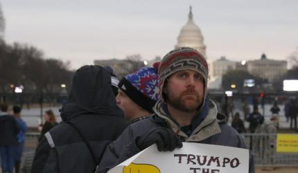 PHOTOS: Protests mark the start of Trump's presidency