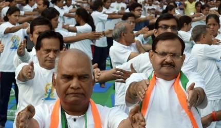 PHOTOS: Netas bend and twist for Yoga Day