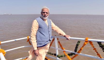 PM launches ferry service, slams UPA for delaying his 'dream project'