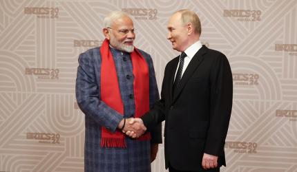Modi Stands Out In A Room Of Suits