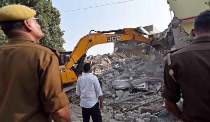 Girl fleeing with books during demolition shocking: SC