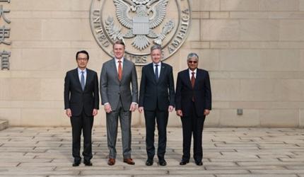 Quad envoys dare China with rare meet in Beijing