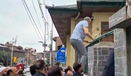 Martyrs' Day row: Omar climbs graveyard wall, jostles with police