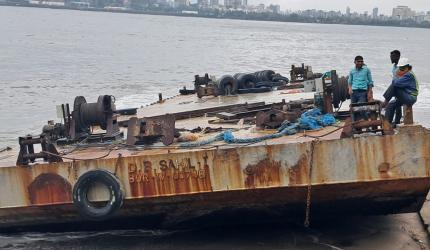 Iron, man! Debris from barges wash ashore in Mumbai