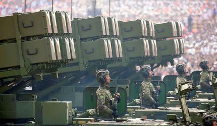China displays new missiles, weapons as Xi hosts Putin, Kim