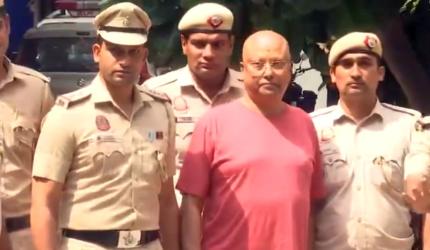 Delhi baba's phone has pics, chats with women