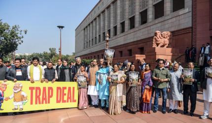 Opposition calls US trade pact a 'trap deal', steps up protest