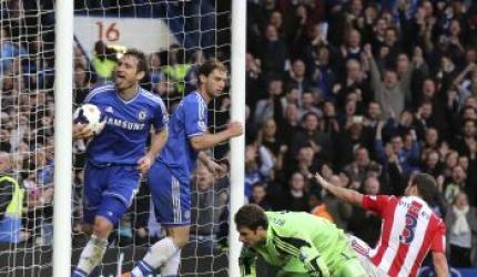 Chelsea go top with Stoke win, City thump Saints