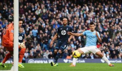 Man City put six past hapless Spurs, United held